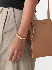AGMES Bracelet Medium Astrid Cuff Shop the AGMES Medium Astrid Cuff in Gold