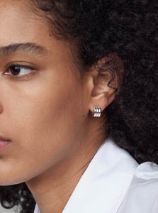AGMES Hoop Earrings Mini Triple Ridge Hoops Shop the AGMES Mini Triple Ridge Hoops in Silver