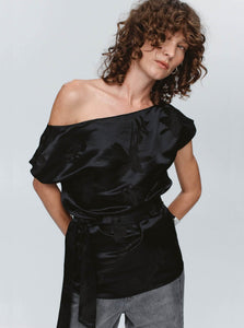 Close-up of woman wearing Marle Jude Top in Black