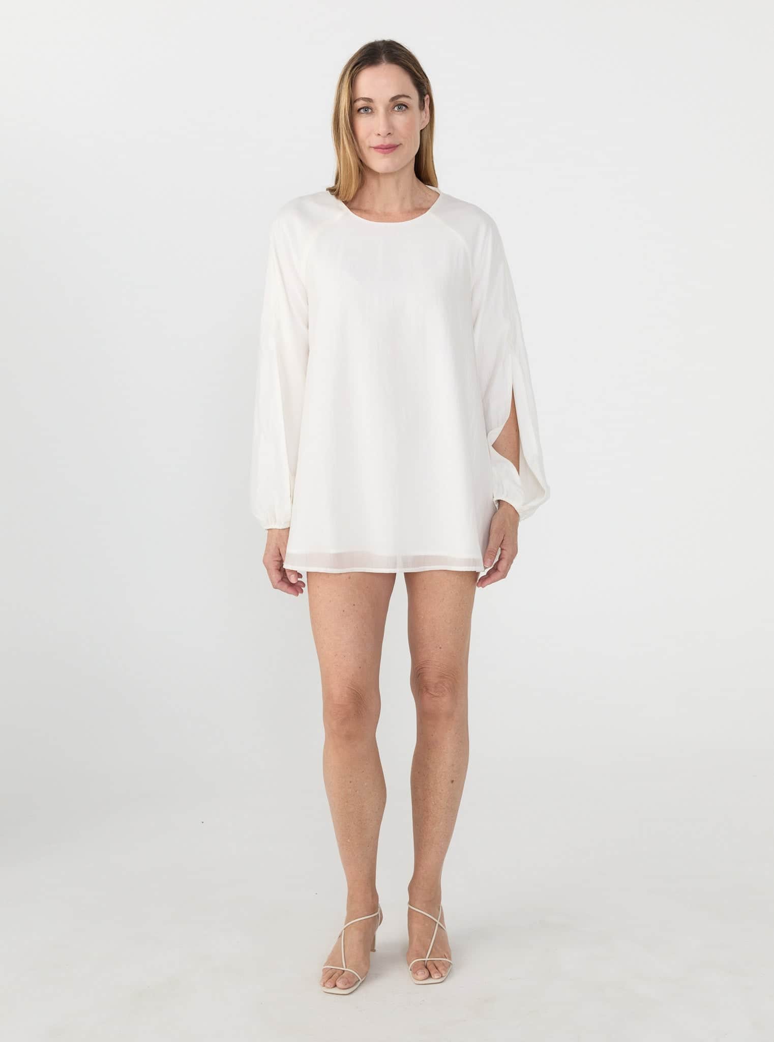 Shop Solaqua's Breezy Clementine Dress in White - RIISE Shop Solaqua's Breezy Clementine Dress in White - RIISE